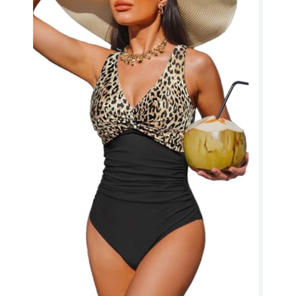 Women’s 
Cheetah Print
Holipick One Piece
Baiting Suit Size M
